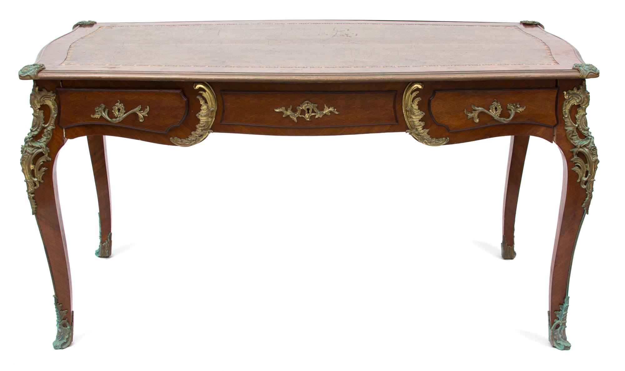 A Louis XV Style Gilt Bronze Mounted Parquetry Mahogany Bureau Plat Height 31 x width 59 x depth 34 inches. — 20TH CENTURY