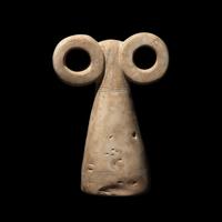 A Mesopotamian Stone Spectacle Idol