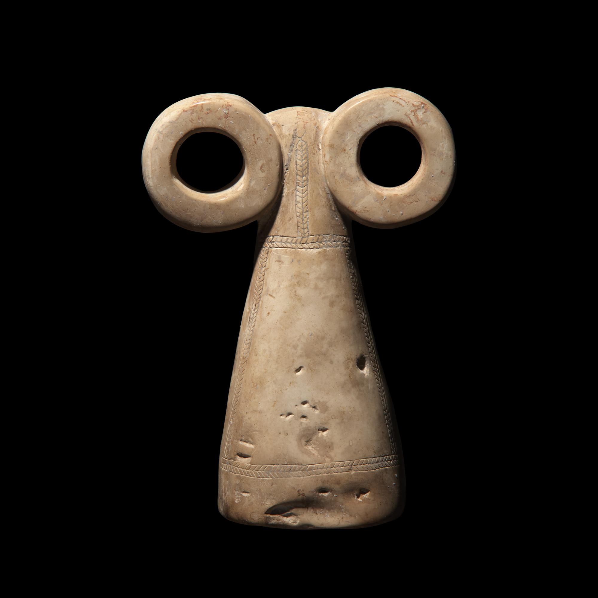 A Mesopotamian Stone Spectacle Idol