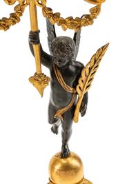 A Pair of Empire Style Gilt and Patinated Bronze Figural Two-Light Candelabra