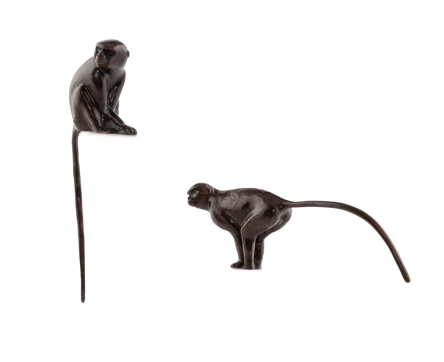 A Pair of Donald Greig Bronze Monkey Figures