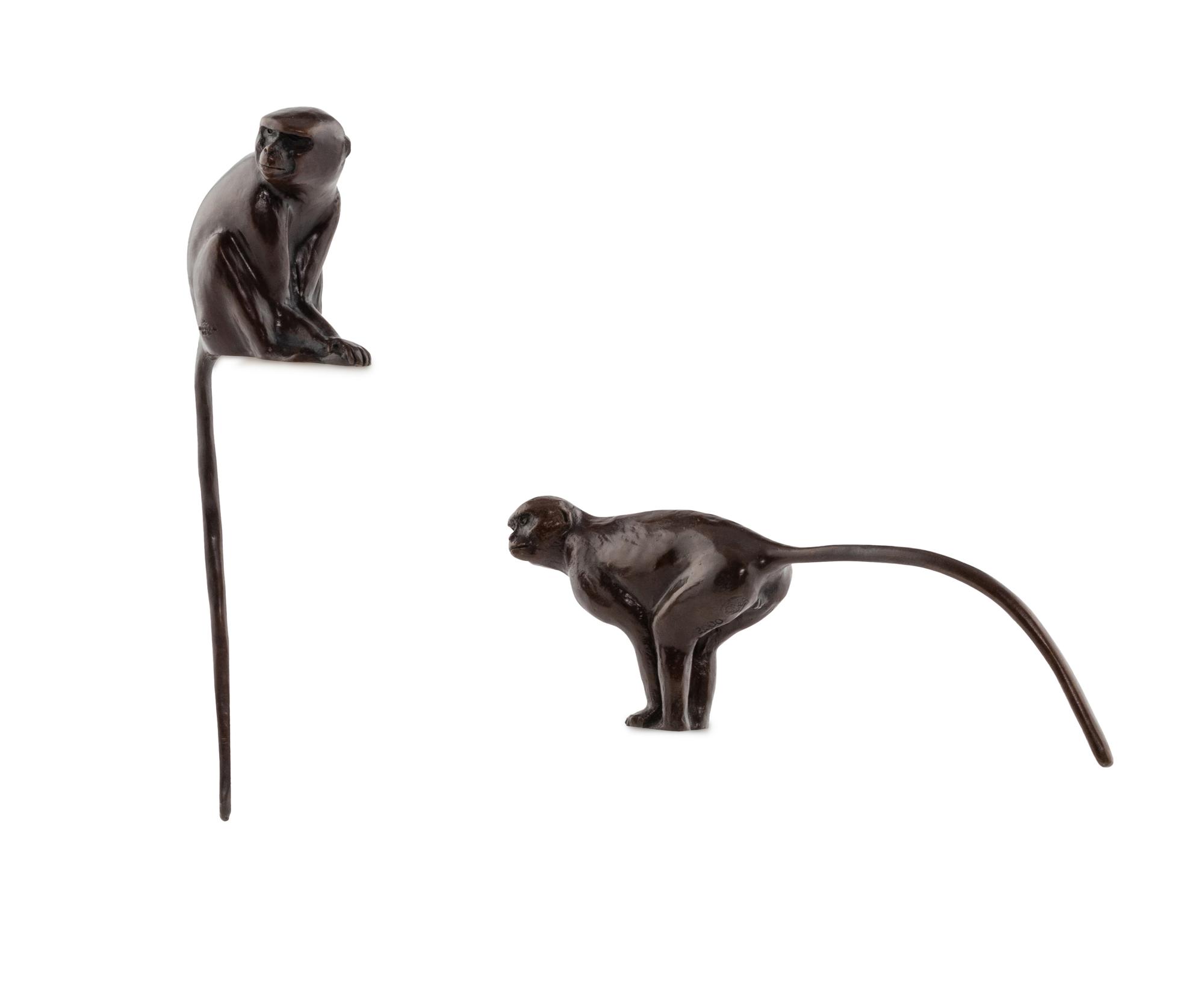 A Pair of Donald Greig Bronze Monkey Figures