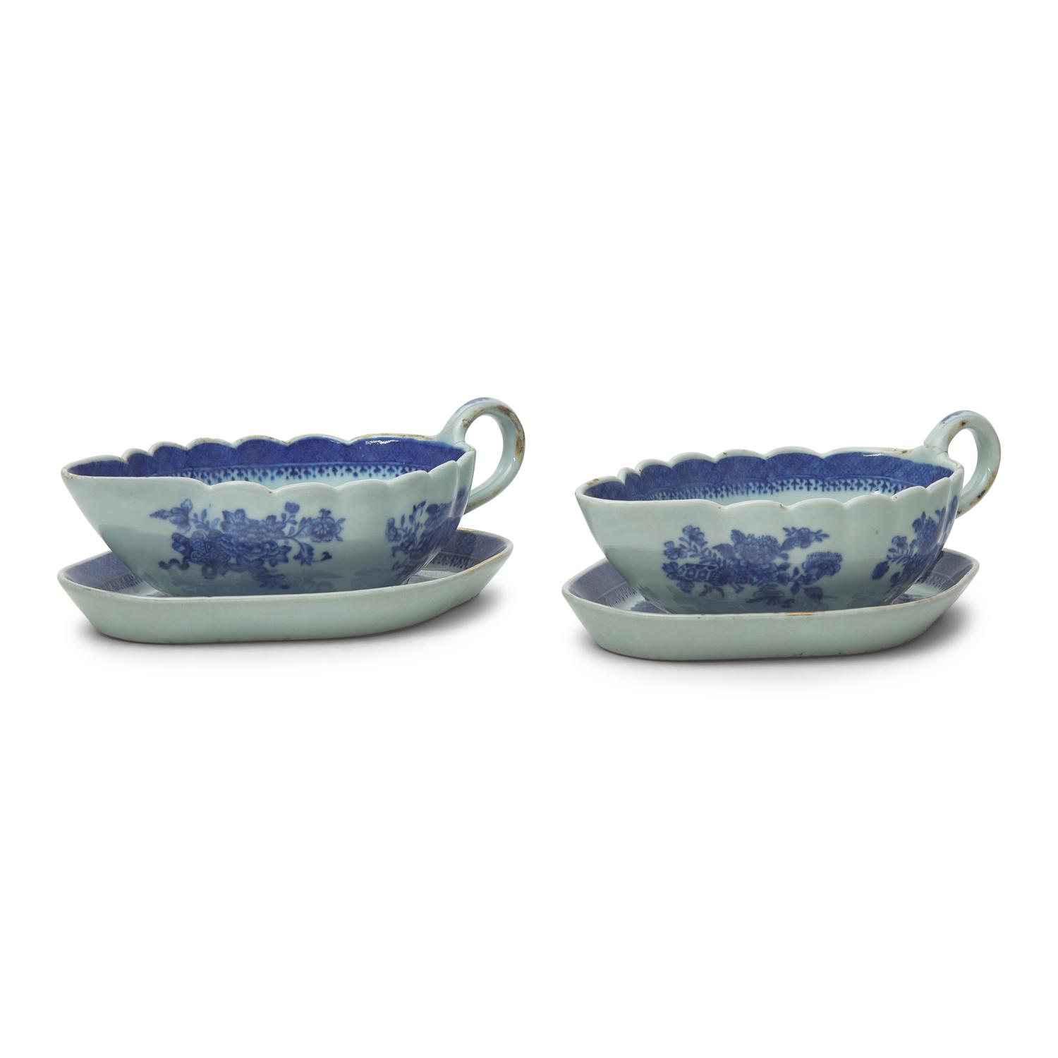 A Pair of Chinese Export Porcelain Fitzhugh Sauce Boats and Stands