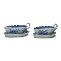 A Pair of Chinese Export Porcelain Fitzhugh Sauce Boats and Stands