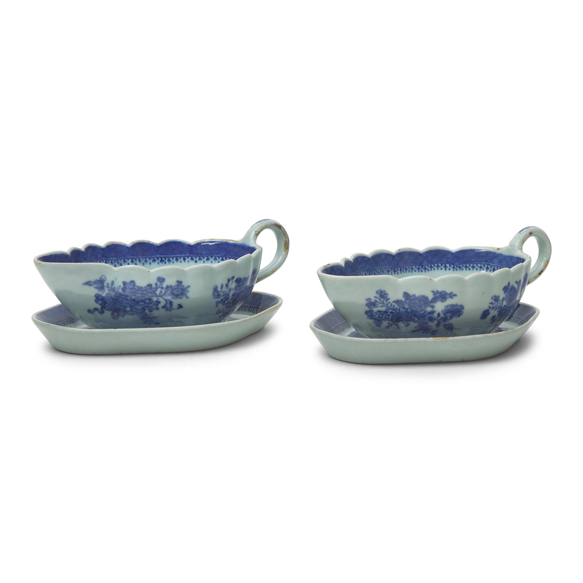 A Pair of Chinese Export Porcelain Fitzhugh Sauce Boats and Stands