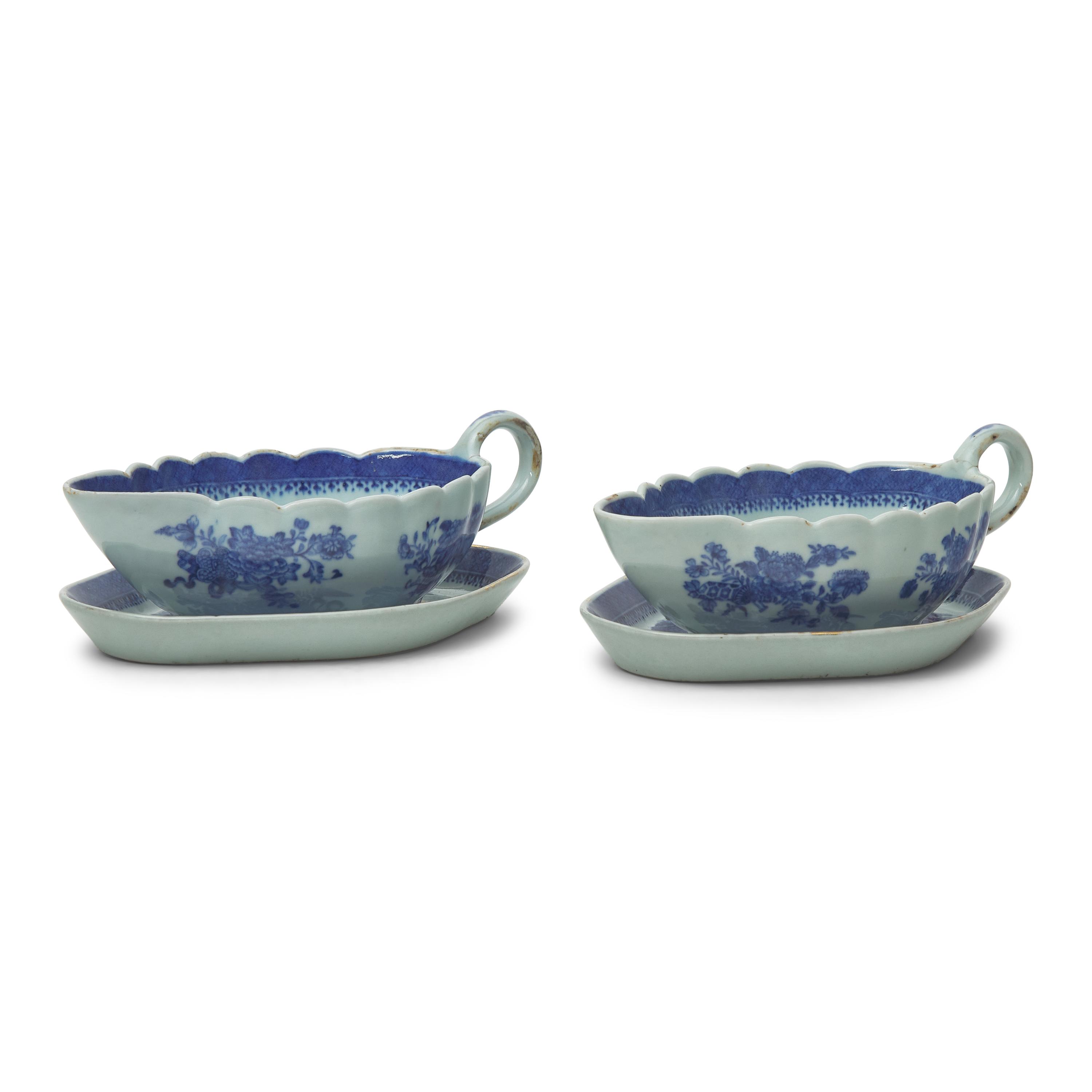 A Pair of Chinese Export Porcelain Fitzhugh Sauce Boats and Stands