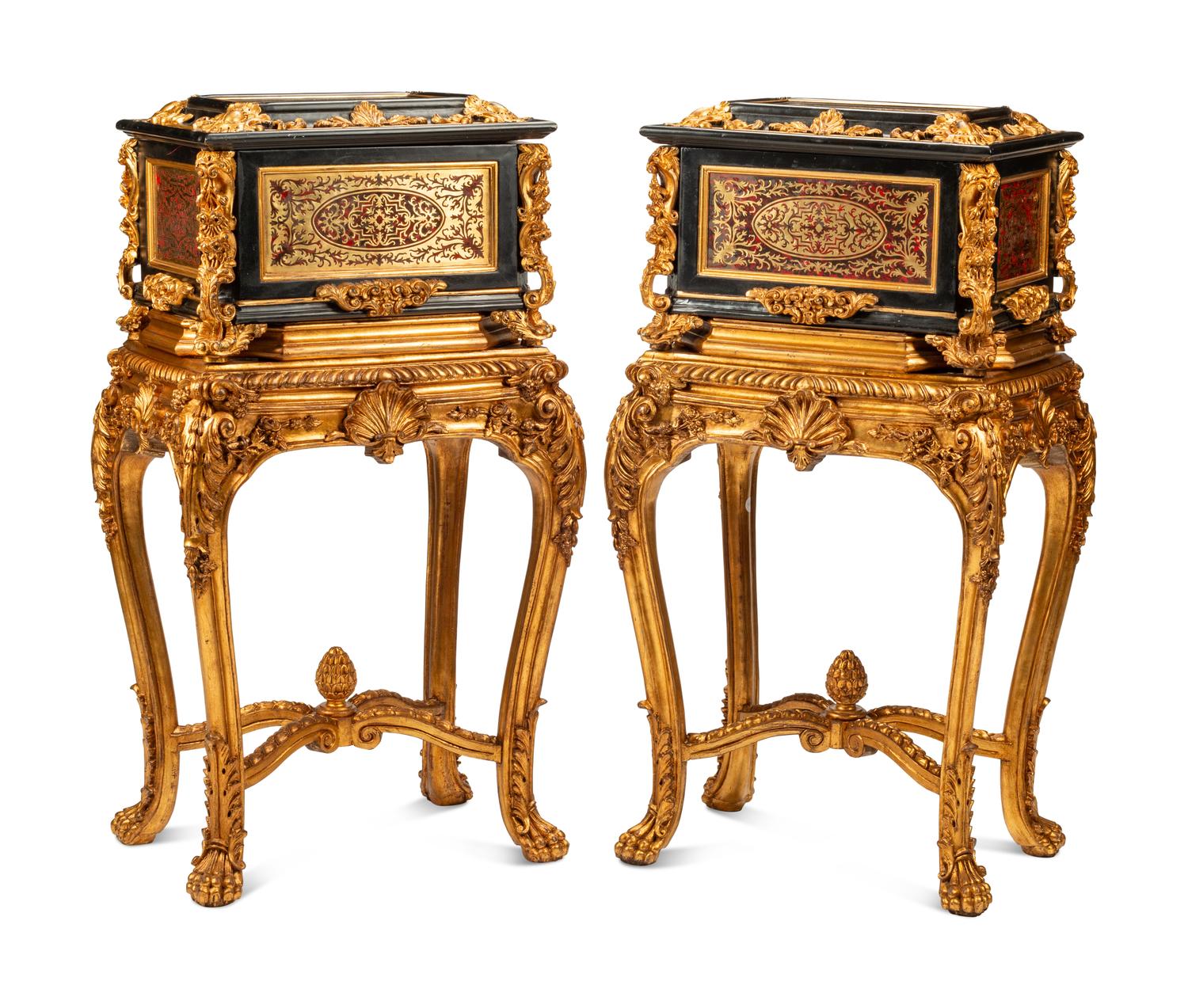 A Pair of Boulle Marquetry and Giltwood Caskets on Giltwood Stands