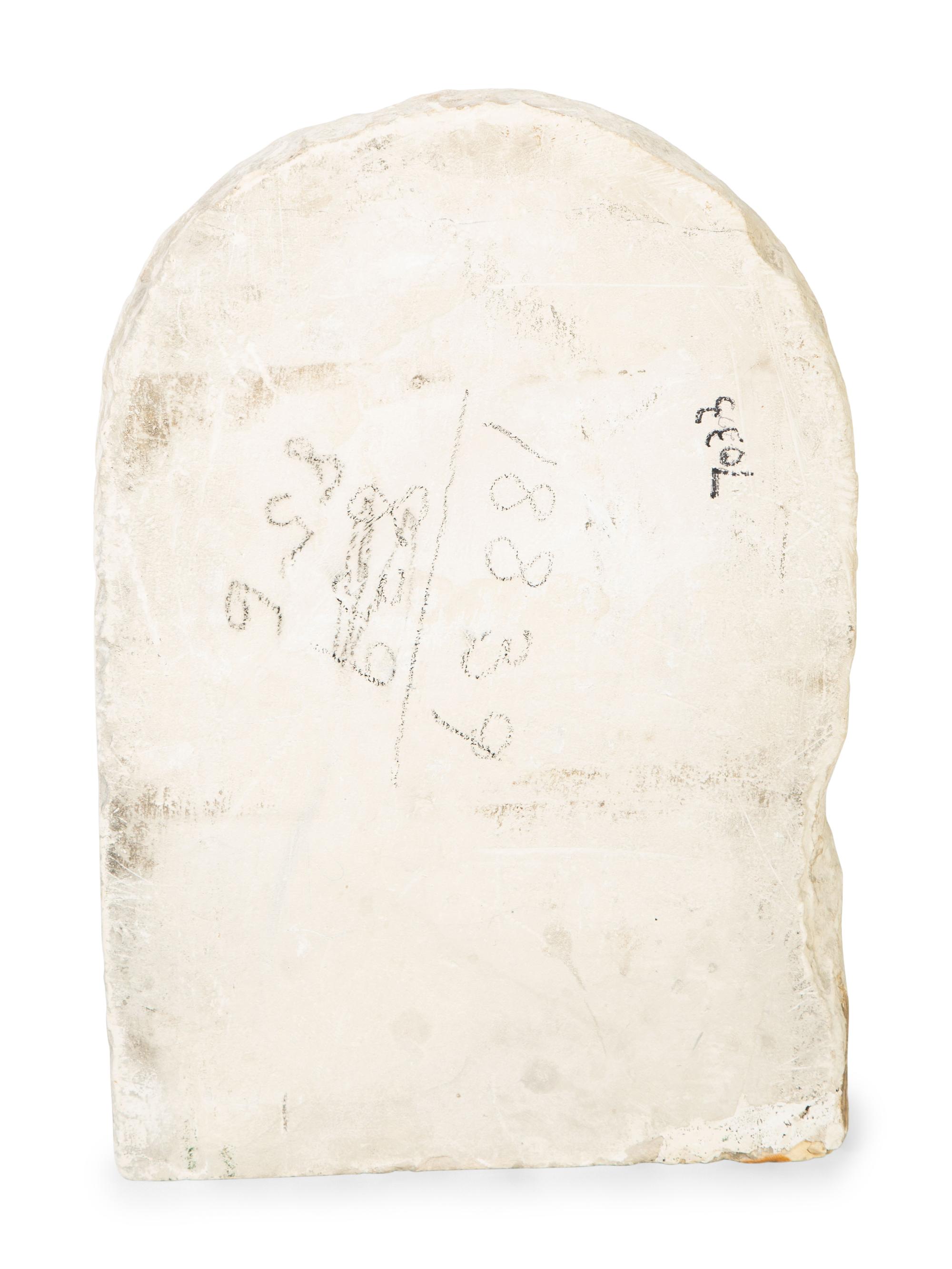 An Egyptian Carved Limestone Tombstone Relief After the Antique — 20TH CENTURY
