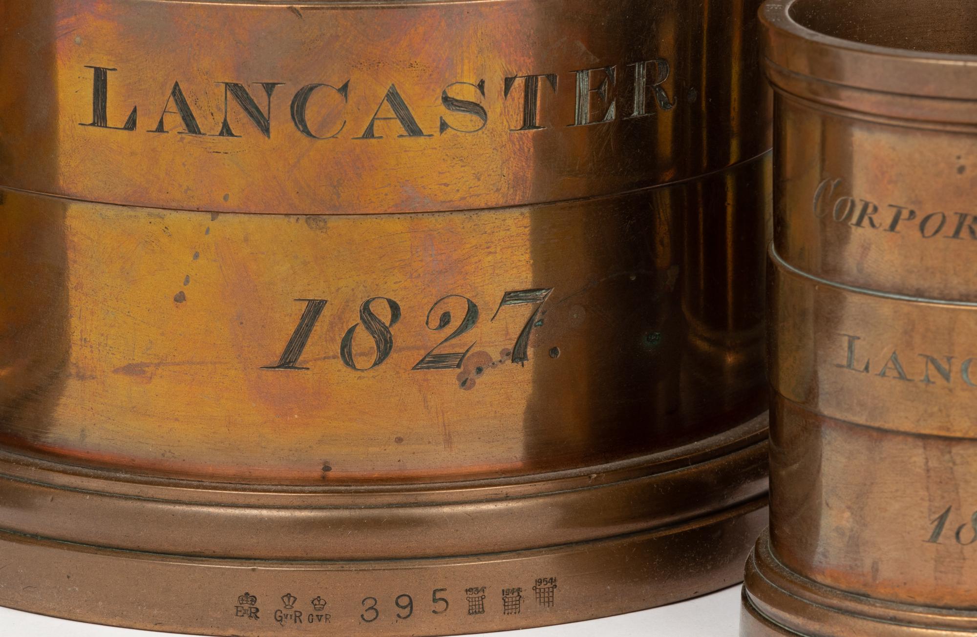 A Set of Eight English Brass Graduated Imperial Bushel Measures