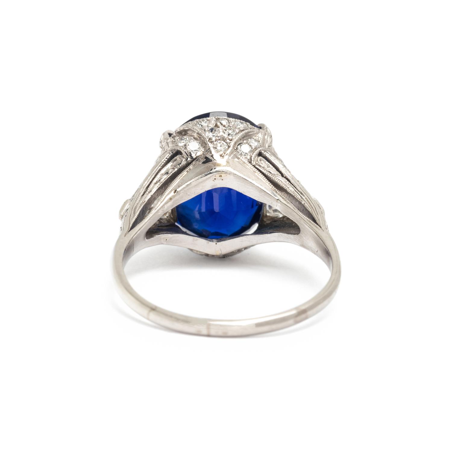 PLATINUM, UNHEATED SAPPHIRE AND DIAMOND RING