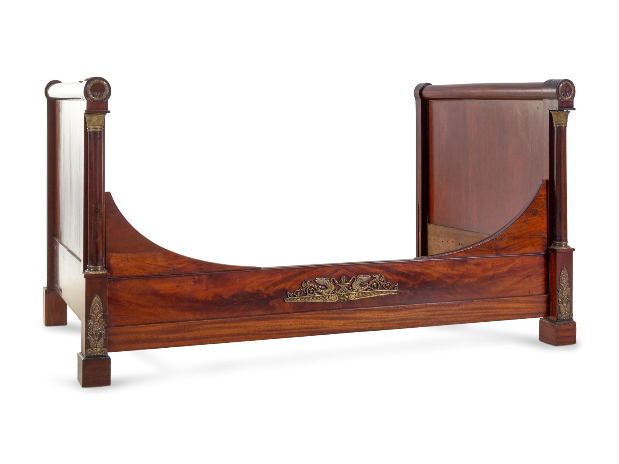 An Empire Style Gilt Metal Mounted Mahogany Bed