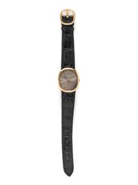 PATEK PHILIPPE, 18K YELLOW GOLD 'ELLIPSE' WATCH WITH TROPICAL BLUE DIAL