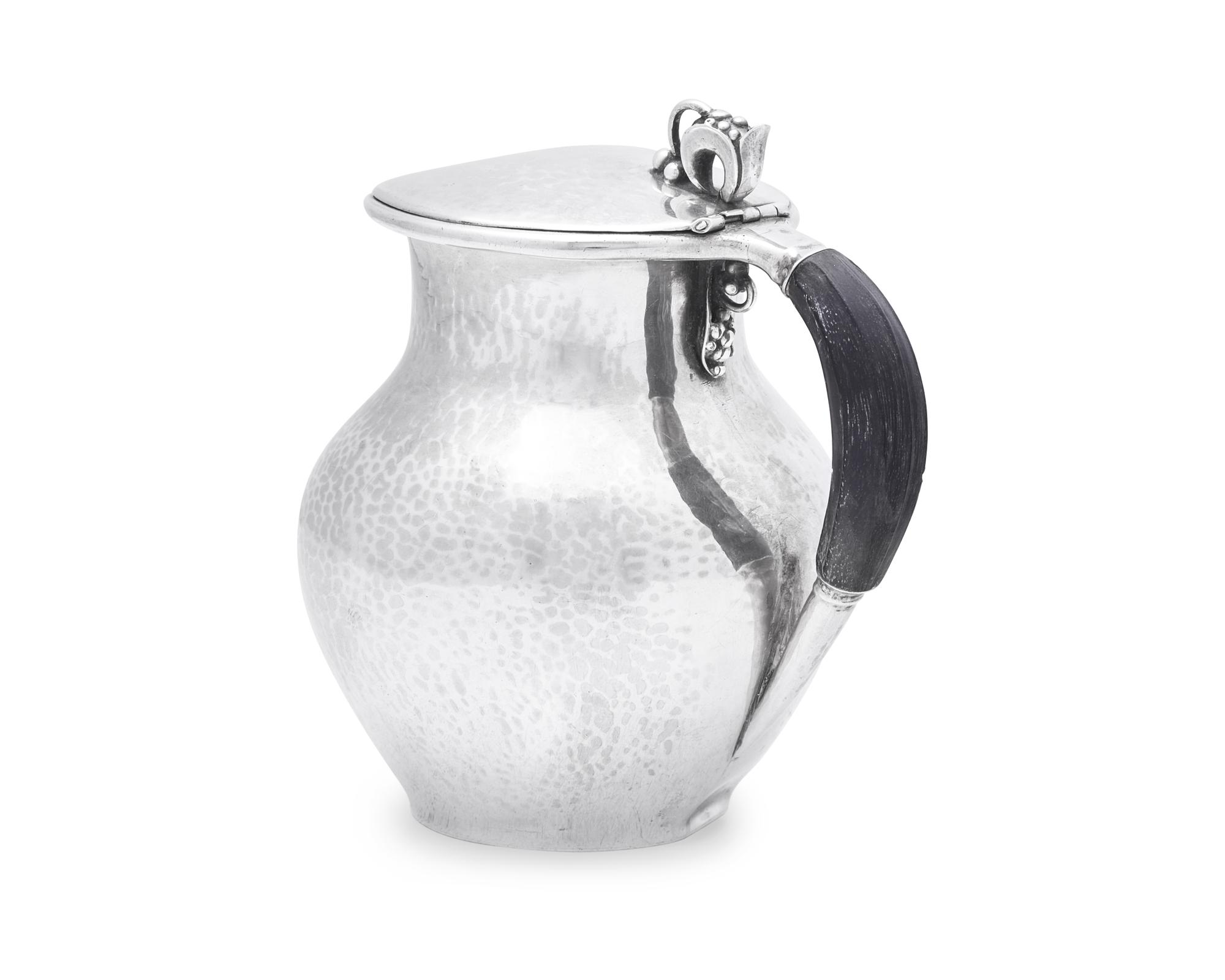 A Georg Jensen Silver Syrup Jug