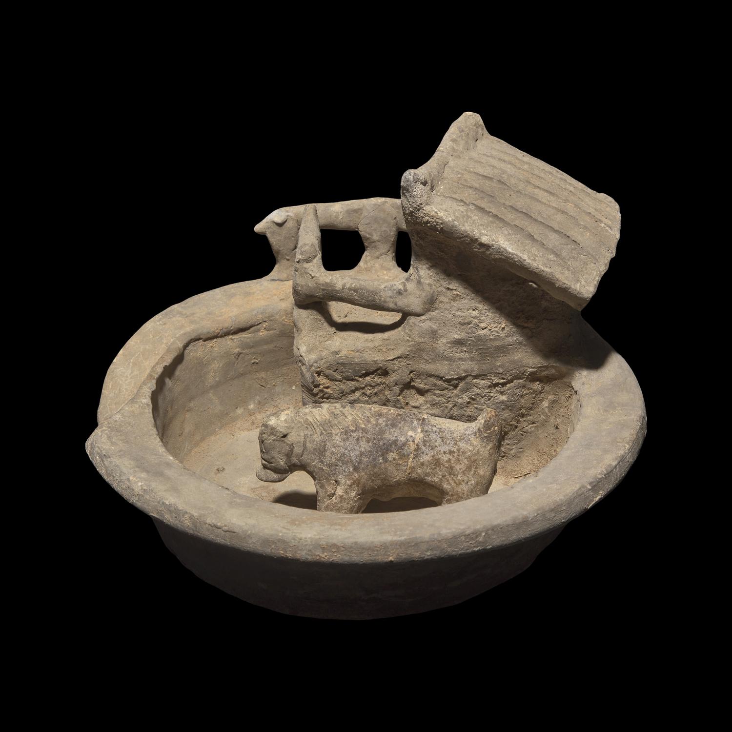 A Chinese Grey Pottery Model of a Pigsty with Occupant, Han Dynasty 漢 陶豬圈