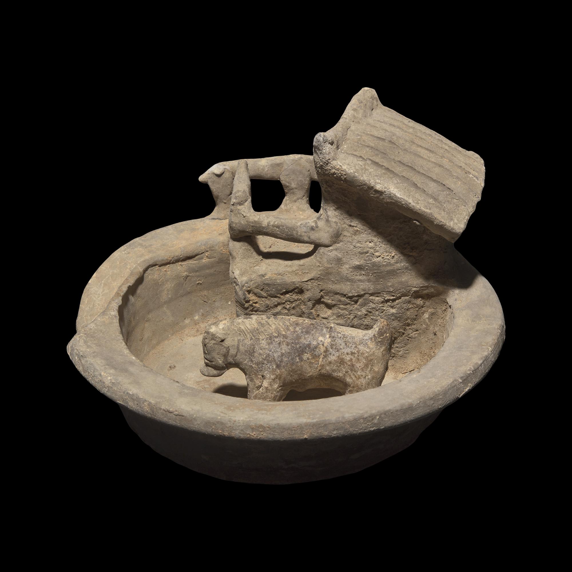 A Chinese Grey Pottery Model of a Pigsty with Occupant, Han Dynasty 漢 陶豬圈