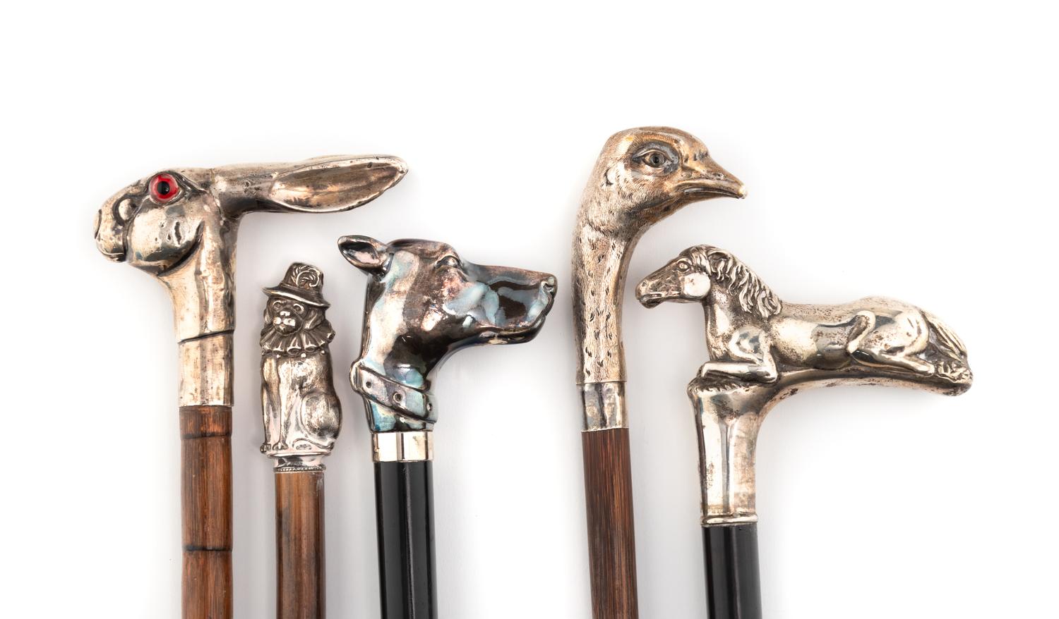 A Group of Five Silver Mounted Zoomorphic Walking Sticks