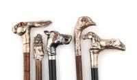 A Group of Five Silver Mounted Zoomorphic Walking Sticks