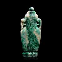 A Chinese Carved Jadeite Vase and Cover 翡翠夔龍紋雙耳蓋瓶