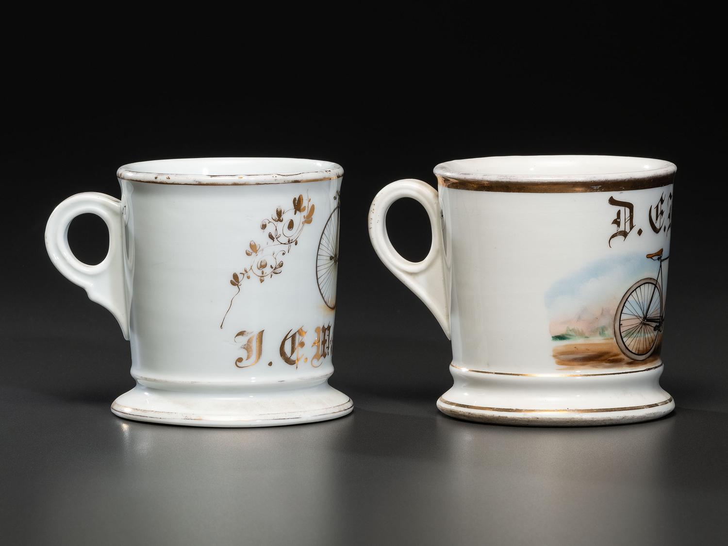 Two Cyclist's Porcelain Shaving Mugs