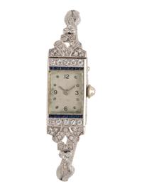 DIAMOND, SAPPHIRE, AND PLATINUM WATCH