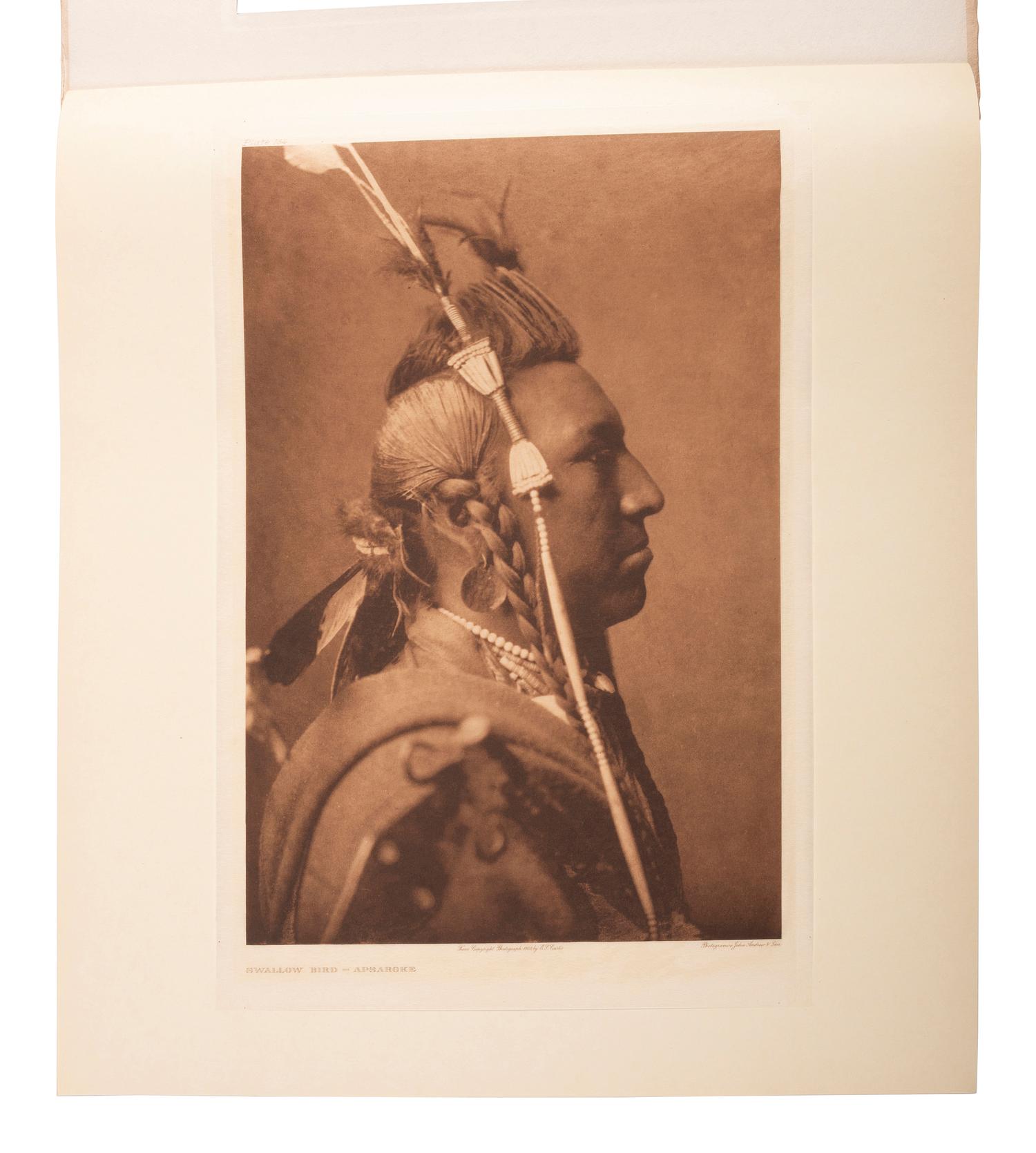CURTIS, Edward (1868-1952). A group of 2 portfolio photogravures of Apsaroke subjects.