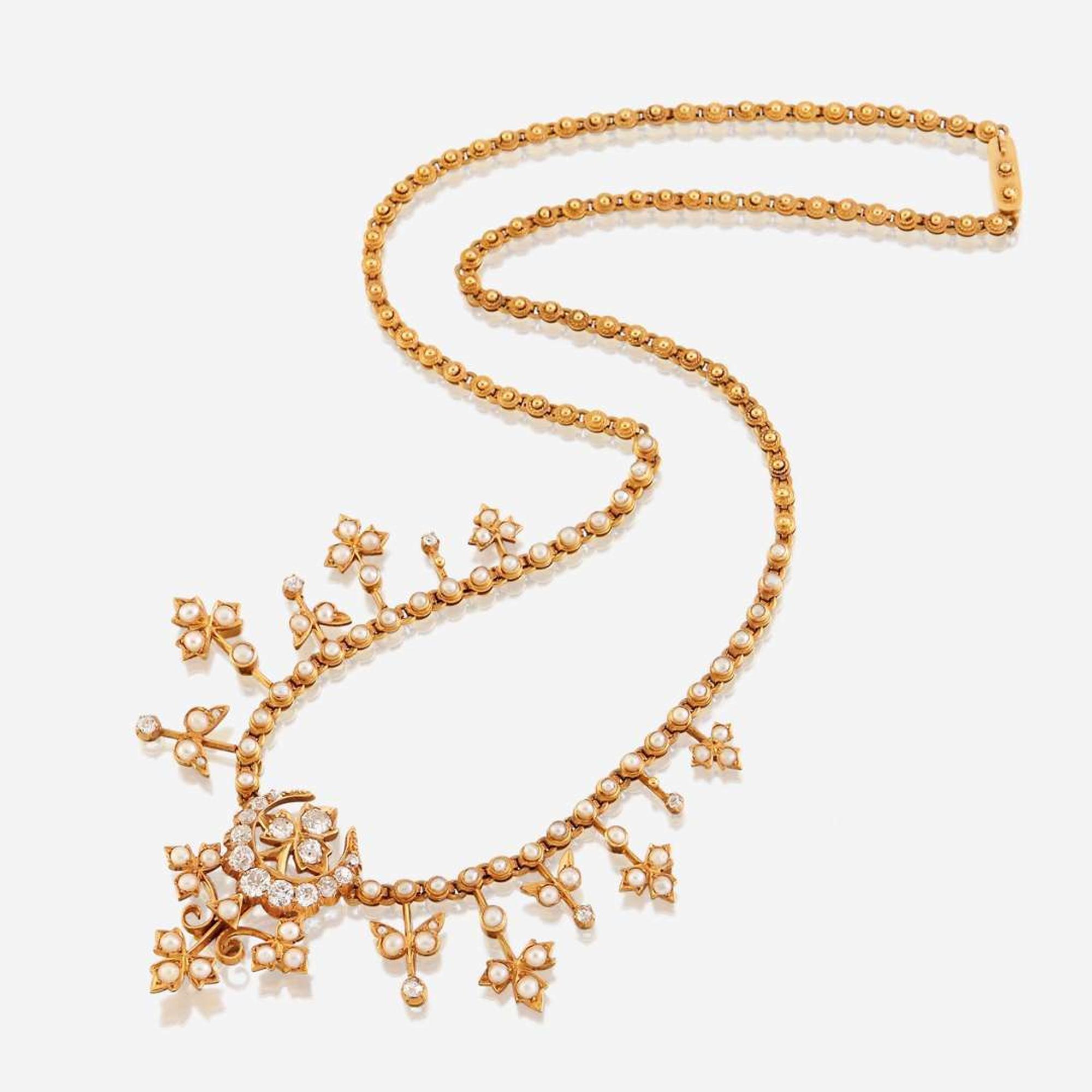 A fourteen karat gold, cultured pearl, and diamond necklace