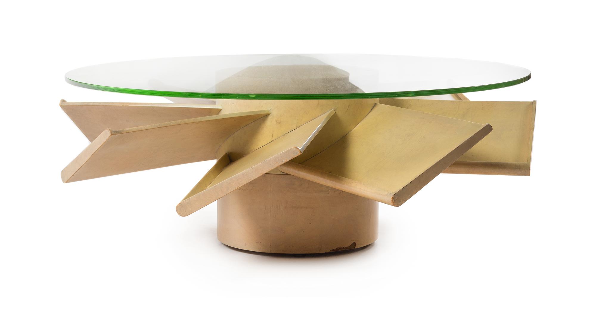 Samuel Marx (American, 1885-1964), QUIGLEY FURNITURE, c.1940, Propeller table, with angled magazine racks designed in 1925