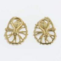 A pair of 18K yellow gold, rock crystal, and blue topaz ear clips, Trianon Nautilus