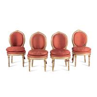 A Set of Four Italian Neoclassical Crème-Painted and Parcel Gilt Side Chairs