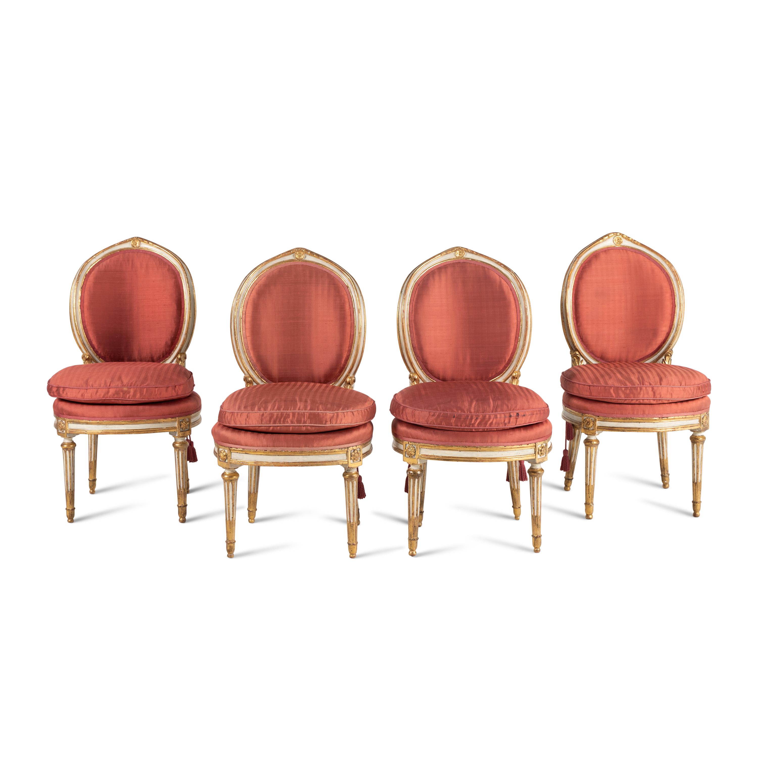 A Set of Four Italian Neoclassical Crème-Painted and Parcel Gilt Side Chairs