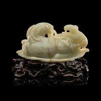 A Chinese Pale Celadon Jade 'Three Rams' Carving 青白玉三羊開泰