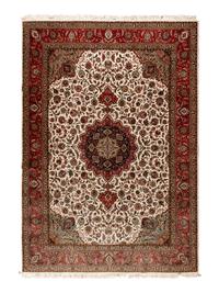A Tabriz Wool Rug