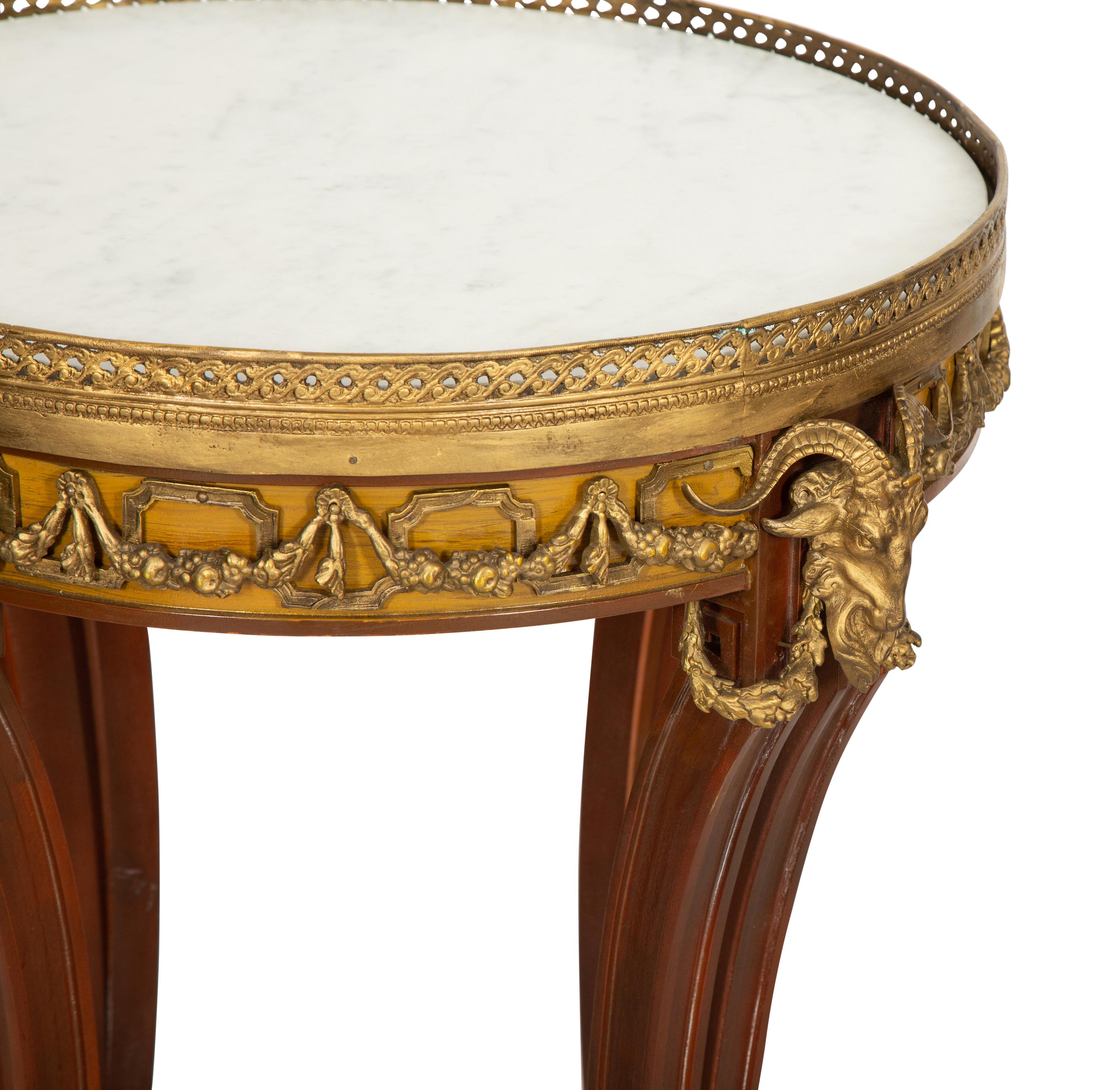 A Pair of Louis XVI Style Gilt Metal Mounted Walnut Gueridons