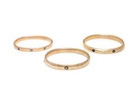 COLLECTION OF YELLOW GOLD, SAPPHIRE, AND DIAMOND BANGLE BRACELETS