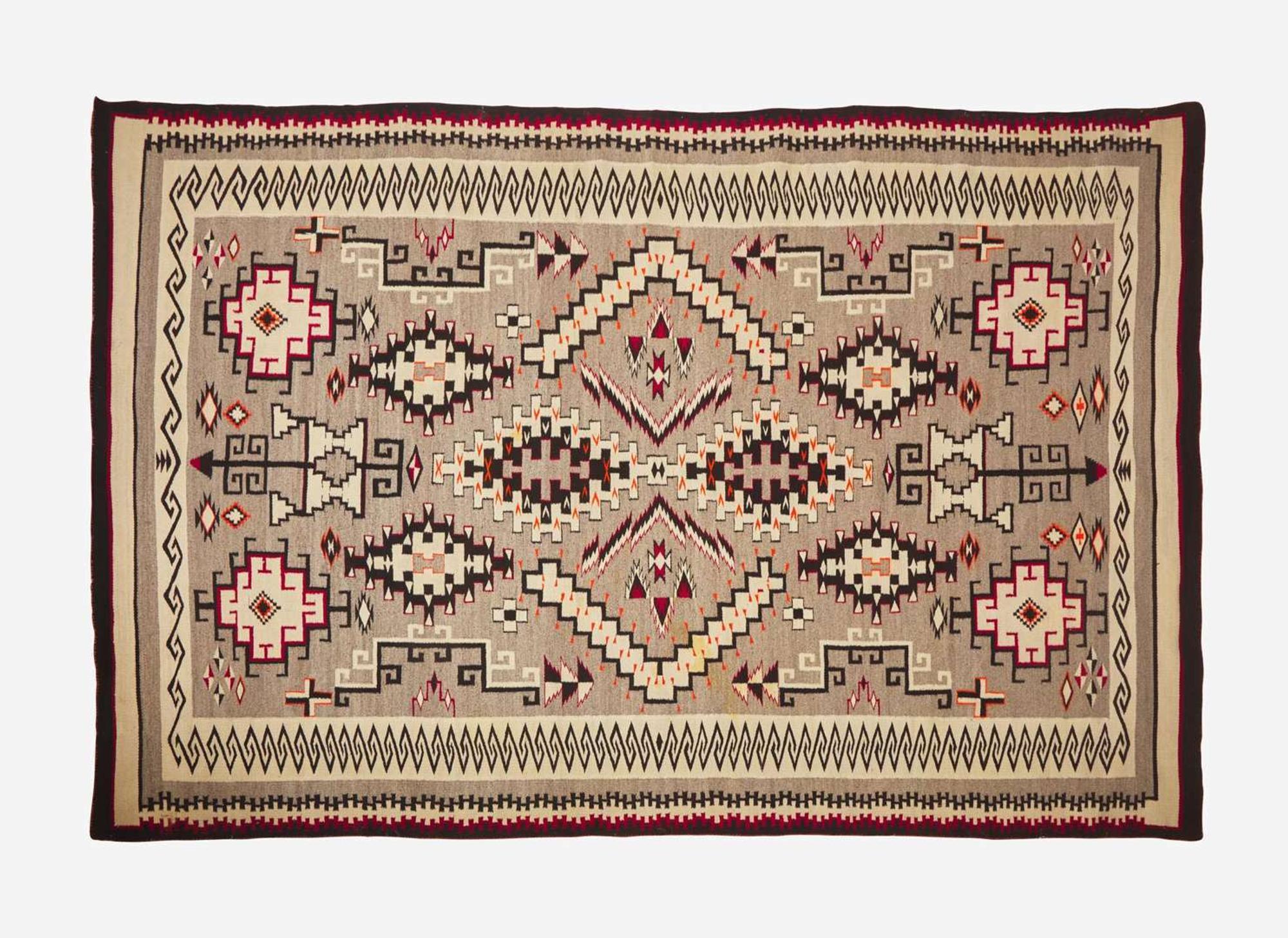A large Navajo woven rug, 20th century