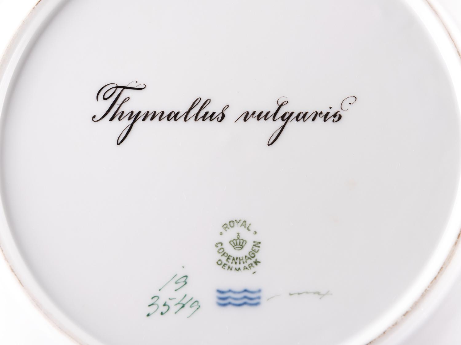 A Set of Twelve Royal Copenhagen Parcel Gilt Porcelain Fish Plates
