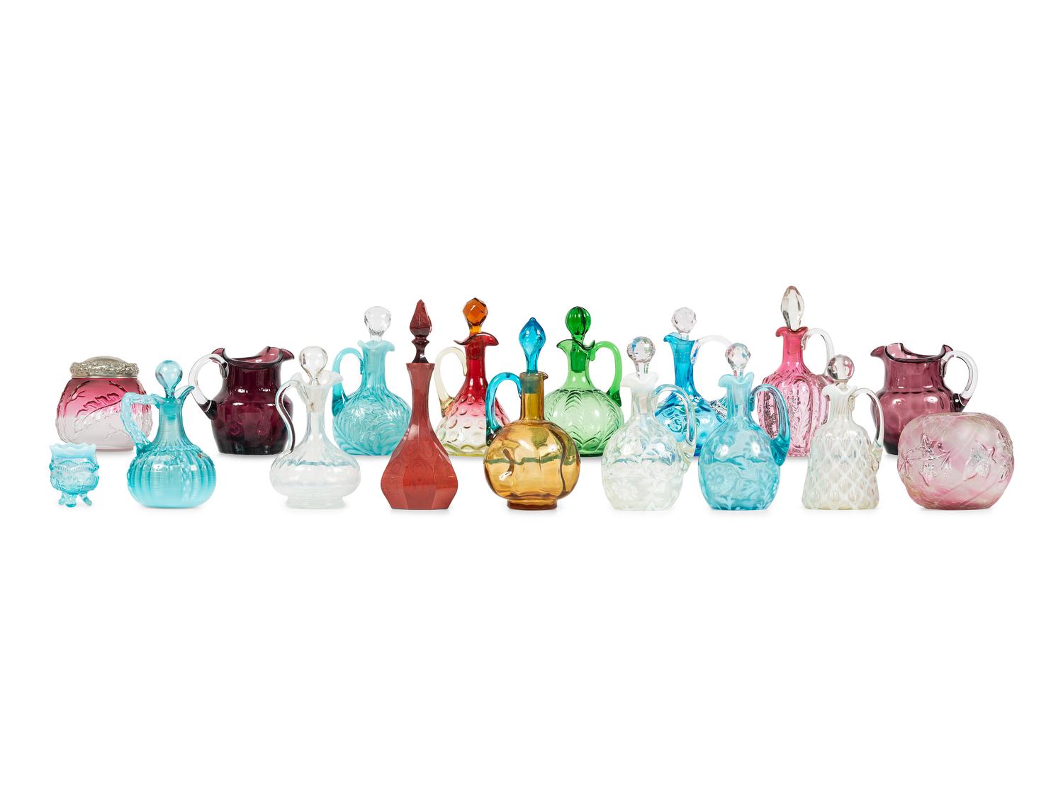 Seventeen Colored and Opal Glass Cruets, Pitchers, Toothpick Holders and Jars
