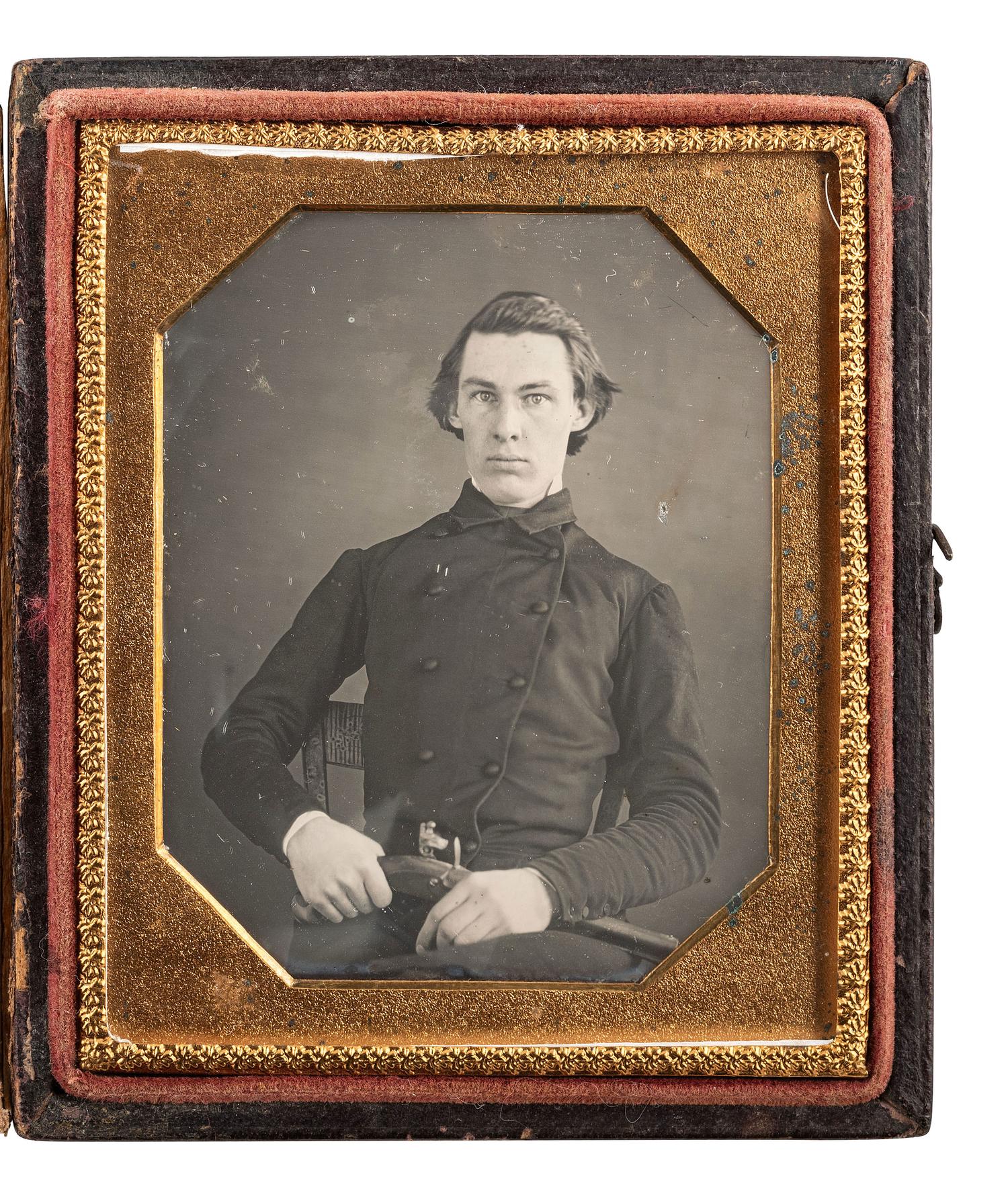 [EARLY PHOTOGRAPHY]. Sixth plate daguerreotype of a gentleman armed with a flintlock pistol.