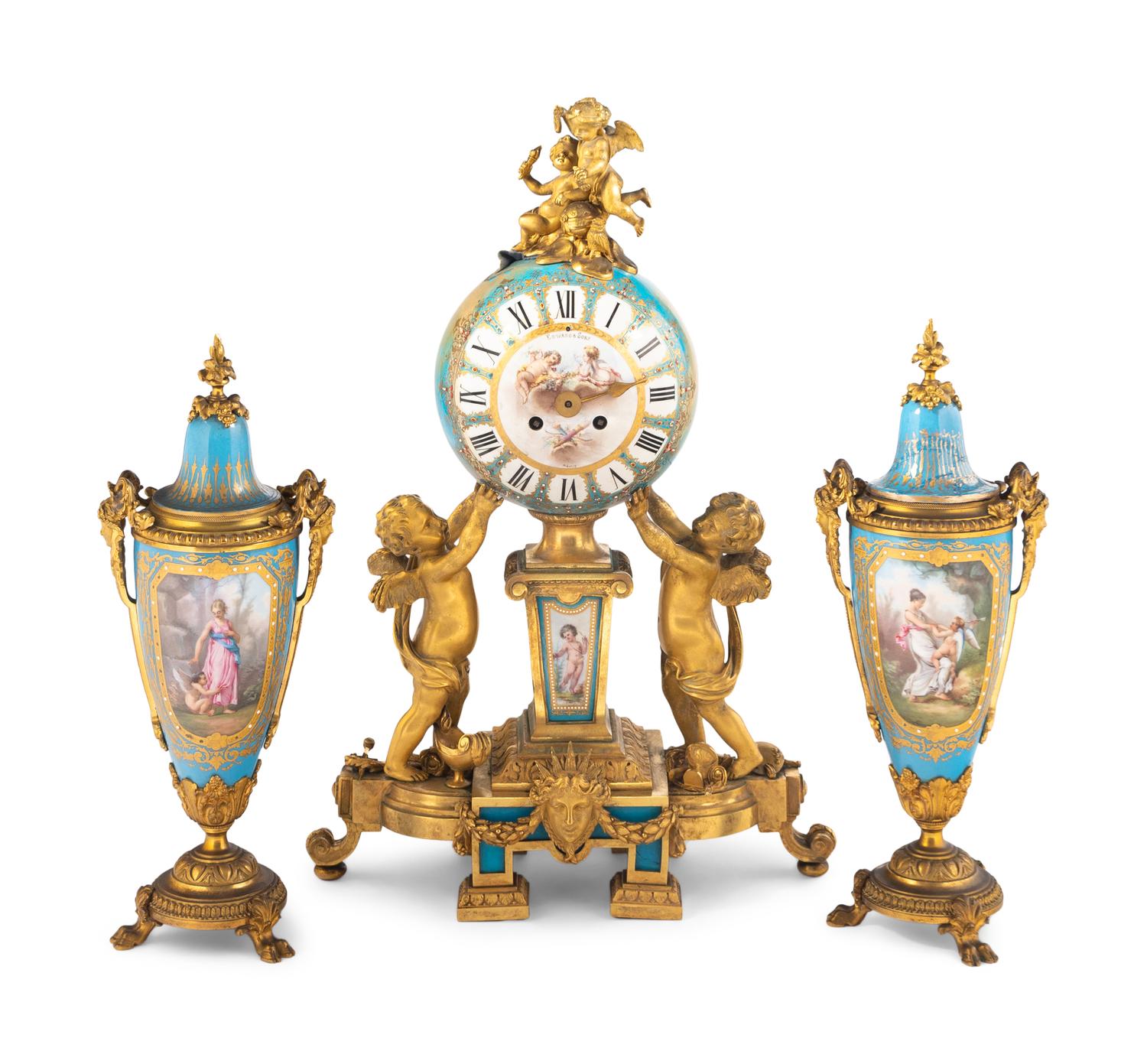 A Sèvres Style Porcelain and Gilt Bronze Mounted Three-Piece Clock Garniture