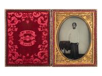 [EARLY PHOTOGRAPHY]. SNELL, William, photographer. Hand-tinted half plate tintype featuring a Chinese subject. Salem, MA: n.d.