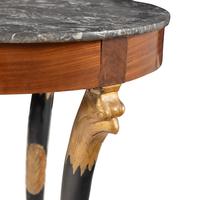 A Charles X Mahogany, Part Ebonized and Parcel Gilt Marble-Top Guéridon