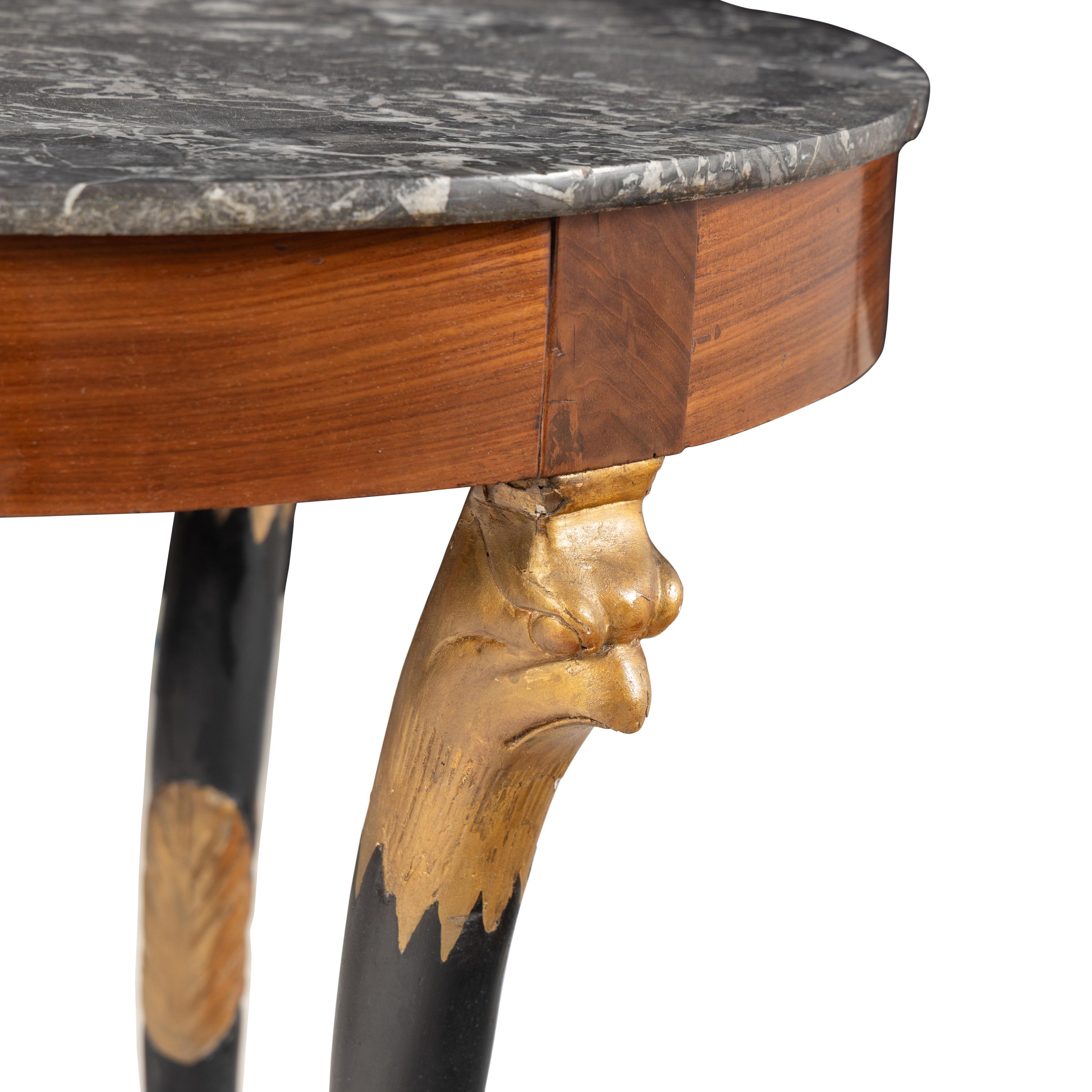 A Charles X Mahogany, Part Ebonized and Parcel Gilt Marble-Top Guéridon