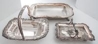 A Collection of Silver-Plate Serving Articles and Parts Width of first 9 3/4 inches.
