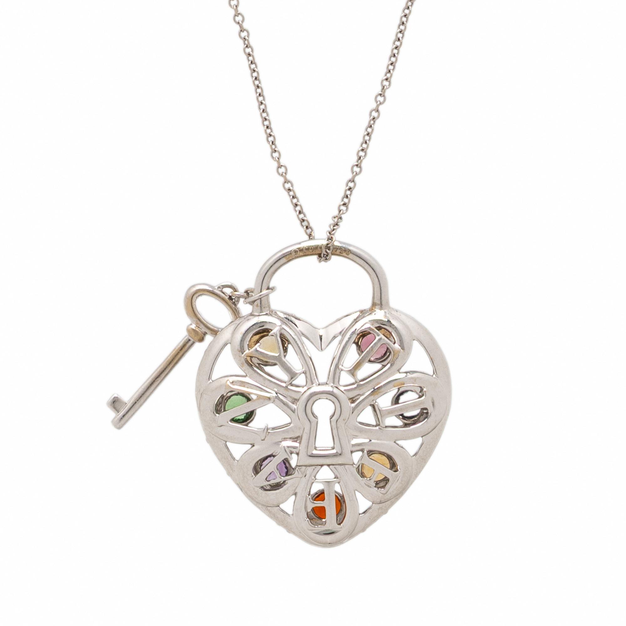 TIFFANY & CO., DIAMOND, MULTIGEM, AND WHITE GOLD 'HEART KEY' PENDANT NECKLACE