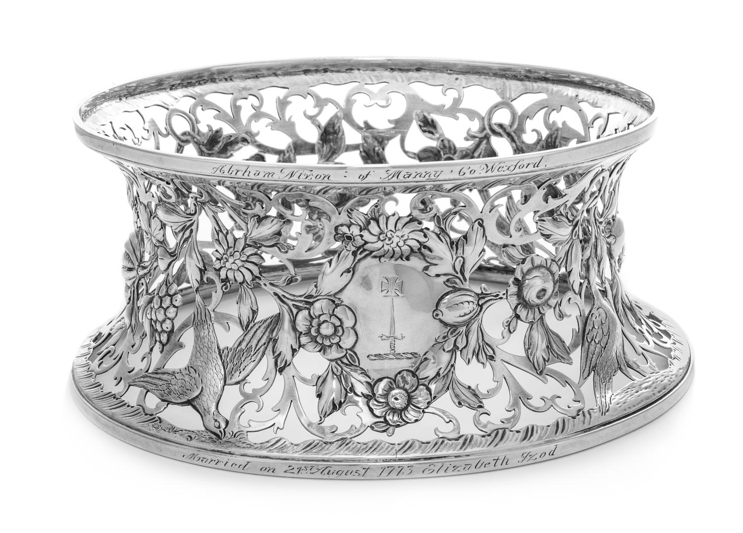 An Irish George III Silver Stand, Maker's Mark Obscured, Dublin, 1771, the body having crane, berry, floral and foliate openwork decora