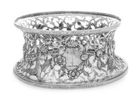 An Irish George III Silver Stand, Maker's Mark Obscured, Dublin, 1771, the body having crane, berry, floral and foliate openwork decora