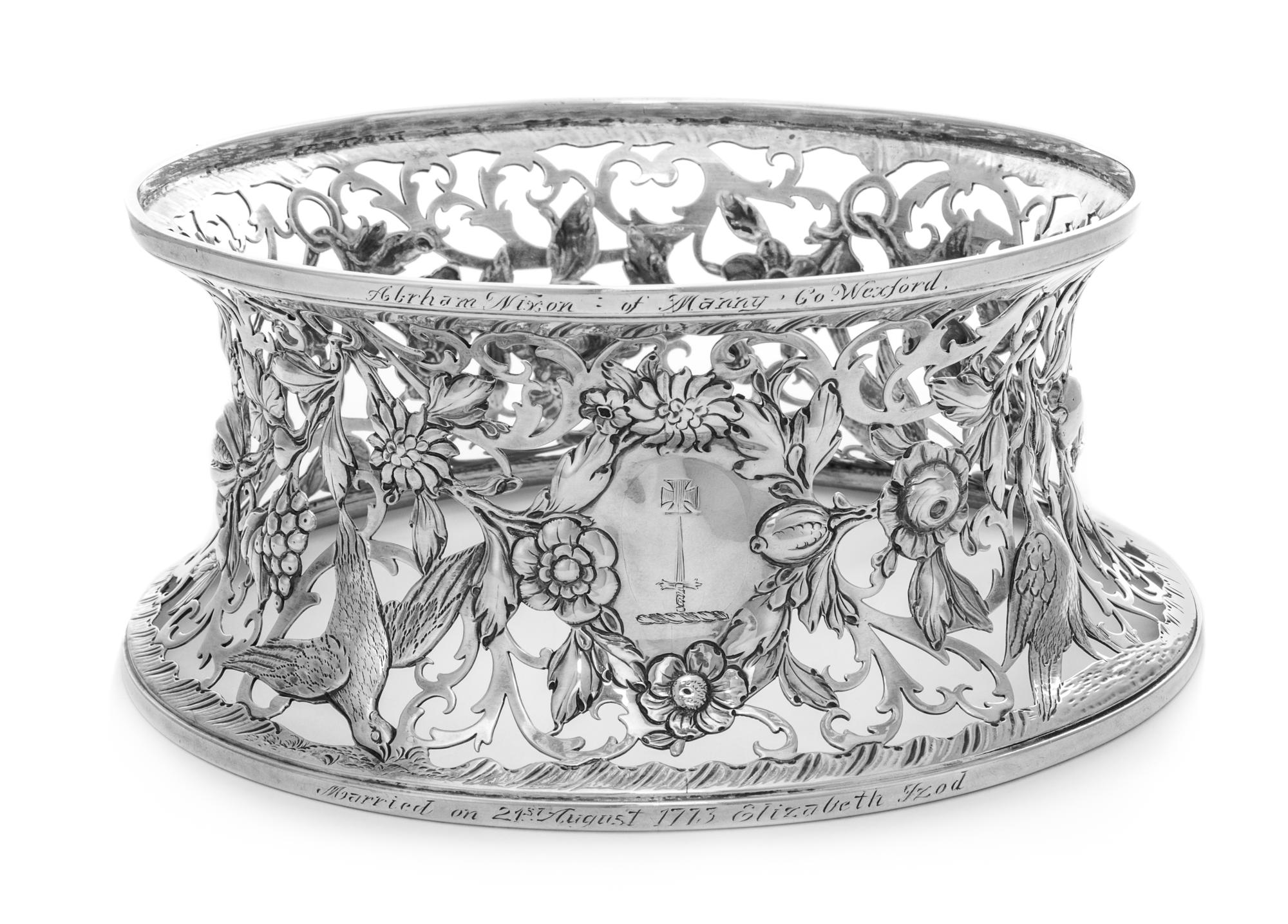 An Irish George III Silver Stand, Maker's Mark Obscured, Dublin, 1771, the body having crane, berry, floral and foliate openwork decora