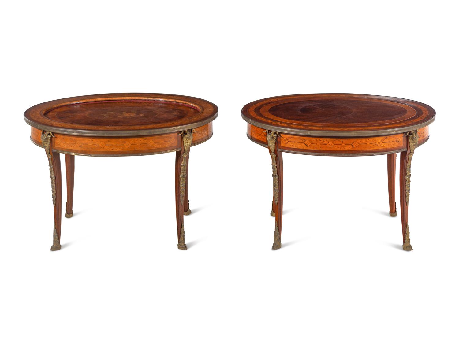 A Near Pair of Louis XV Style Gilt Bronze Mounted Marquetry Low Tables