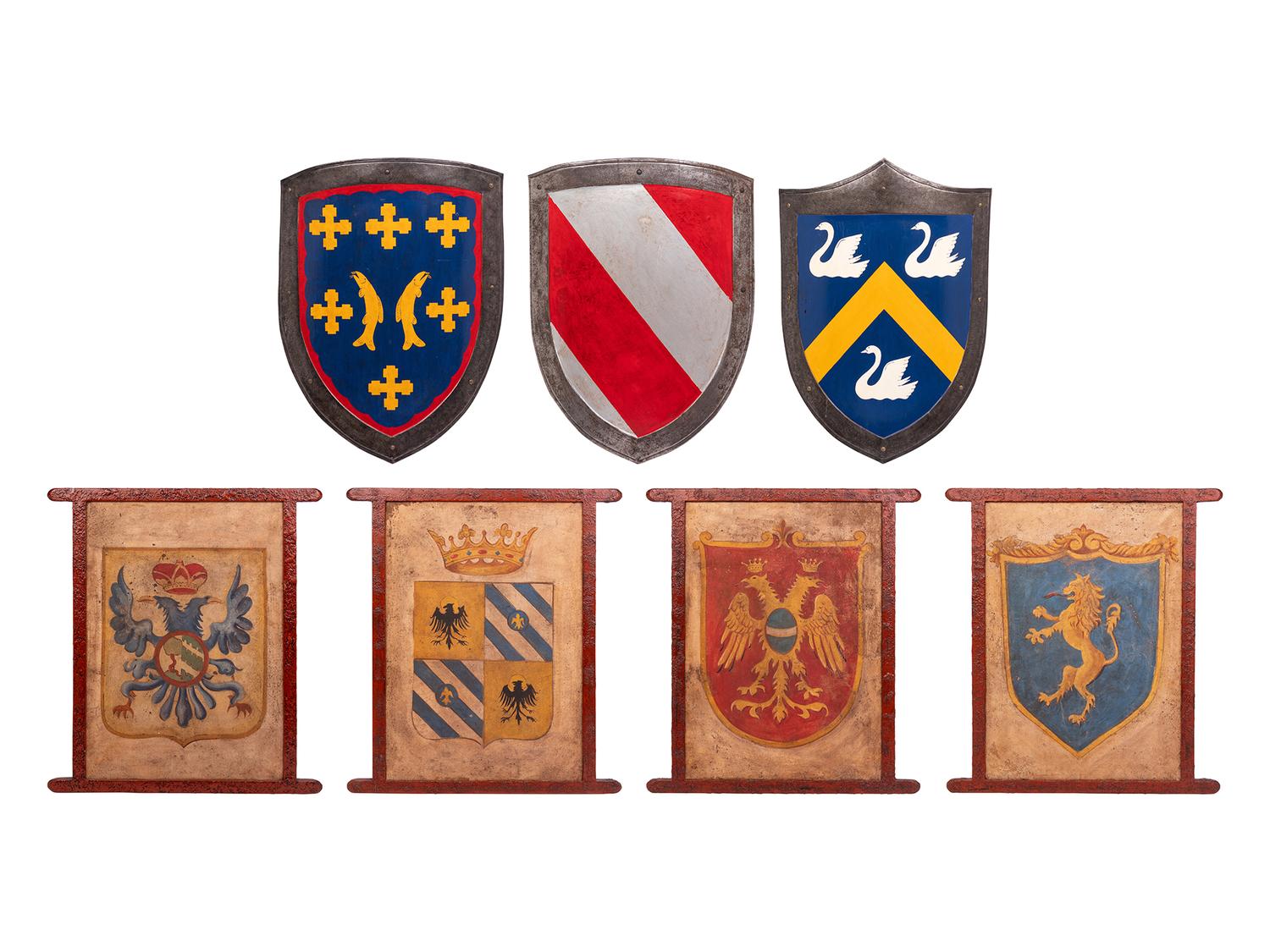 A Group of Three Shields and Four Armorial Panels