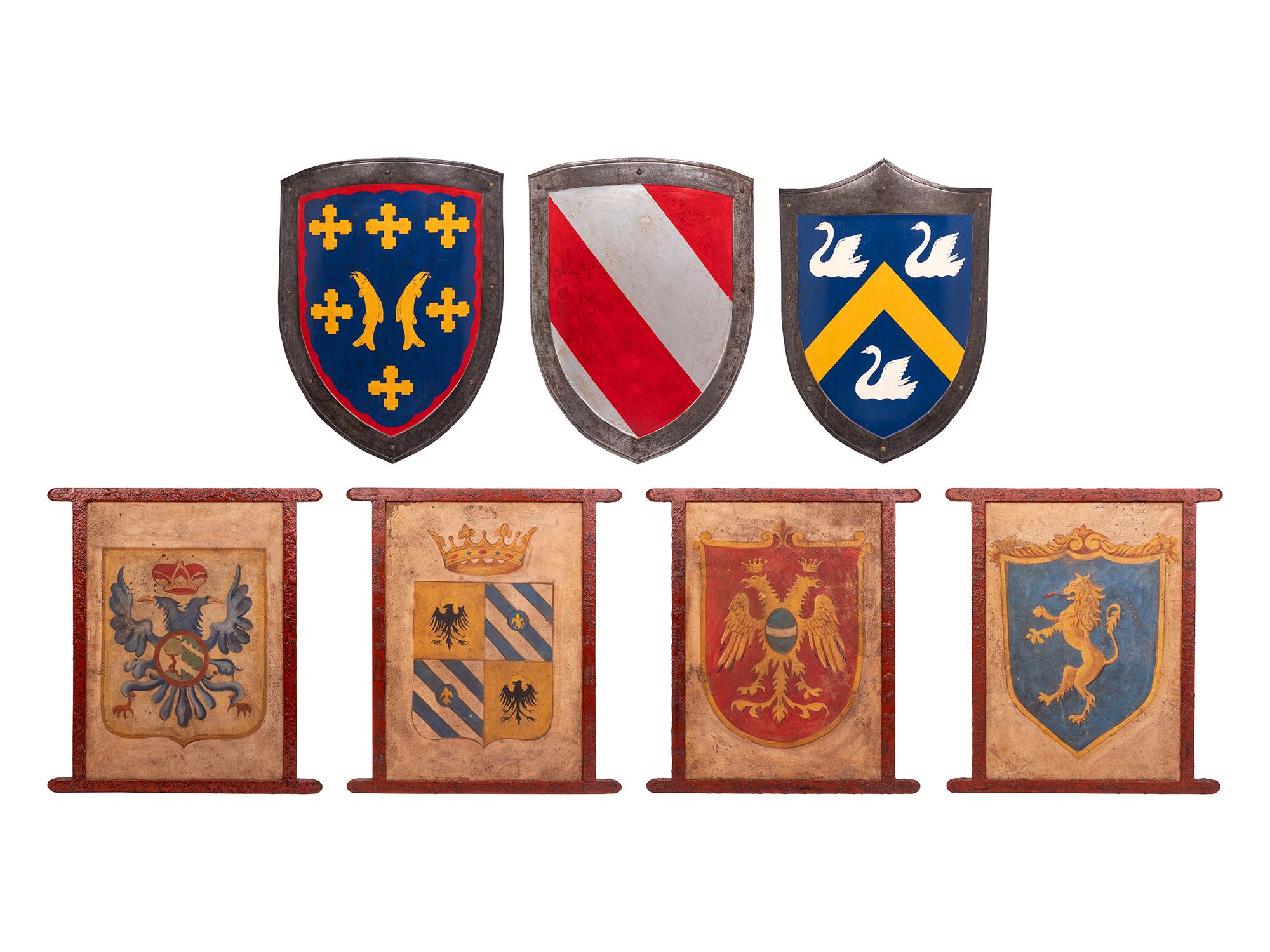 A Group of Three Shields and Four Armorial Panels
